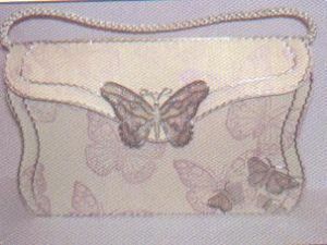 Plaque embossage motif robe