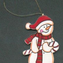 Bonhomme de neige en bois avec canne