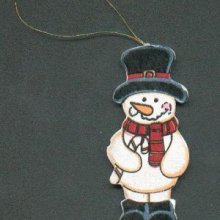 Bonhomme de neige en bois avec écharpe